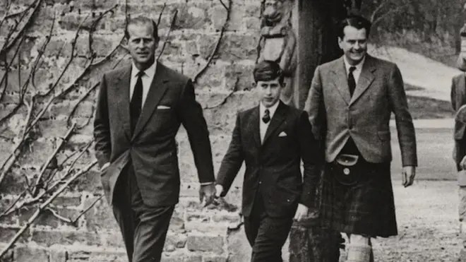 A young King Charles arrives at Gordonstoun, accompanied by the Duke of Edinburgh