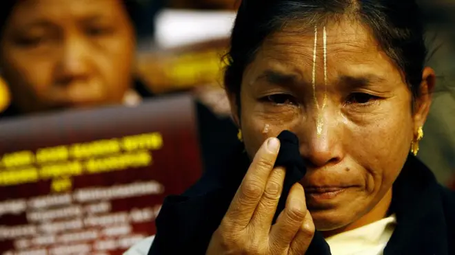 राजधानी दिल्ली में अफ़स्पा क़ानून को हटाने की मांग को लेकर हुए विरोध प्रदर्शन में मणिपुर की एक महिला