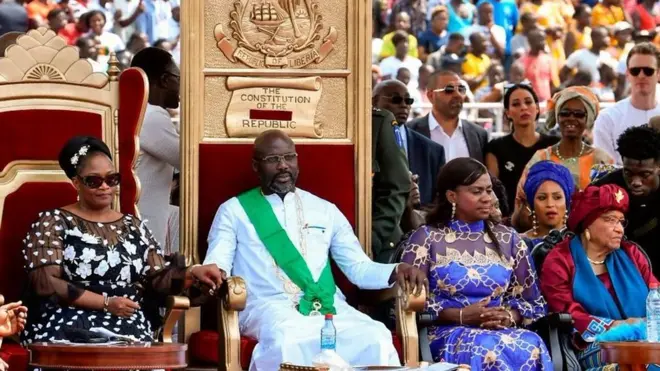 Weah, umushikiranganji wa mbere, umugore wiwe na Sirleaf
