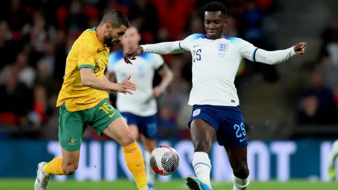 Nketia being challenged by an Australian player