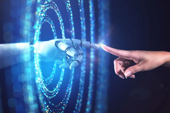 insan eli ile robot eli birbirine dokunuyor 