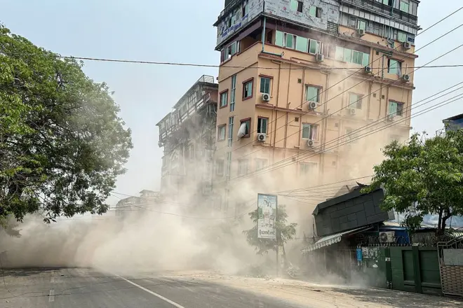 This photo shows a building collapsing in Mandalay on March 28, 2025, during an earthquake.