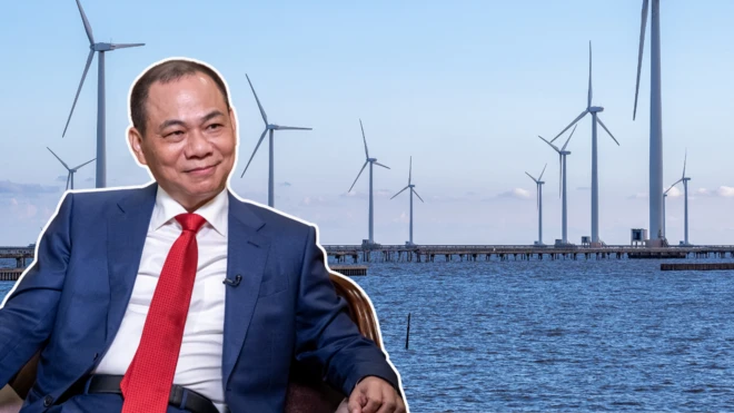 Ảnh thiết kế: Ông Phạm Nhật Vượng mặc áo vest xanh dương, sơ mi trắng, thắt cà vạt đỏ trên nền nhà máy điện gió ở Việt Nam 