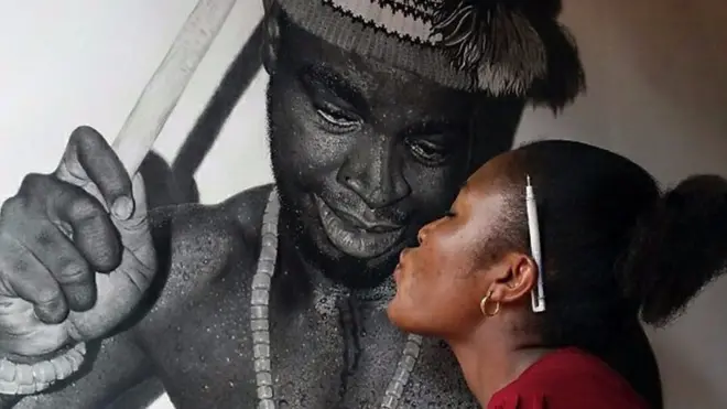 Nwaada Igbo na-ese ihe