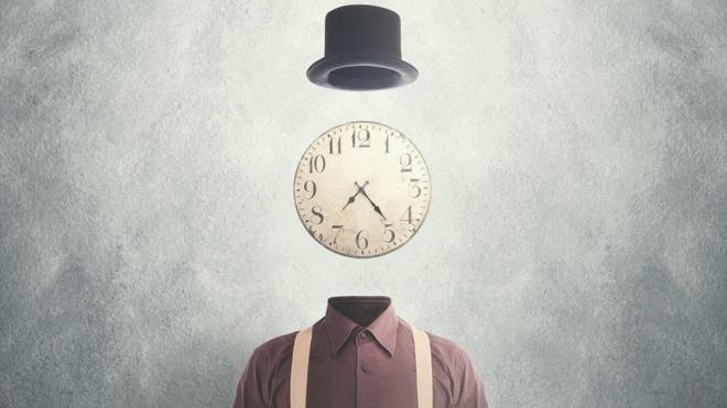 Concept image - surreal man with a clock as his head