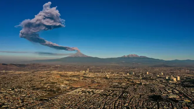 The Popocatepetl Volcano spews ash and smoke as seen from Puebla, central Mexico in 2019.