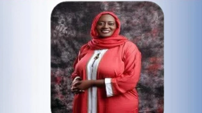 Woman in red standing