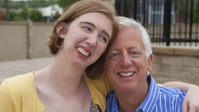 Morgan and Gordon Hartman hugging