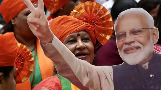 Bharatiya Janata Party (BJP) supporters celebrate at BJP headquarters in Bangalore, India, 04 June 2024.