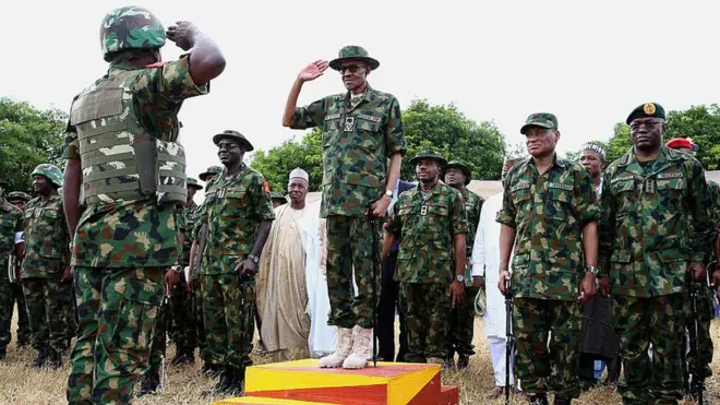 President Buhari na also Commander in Chief of di Armed Forces of di Federal Republic of Nigeria.