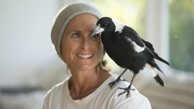 Sam Bloom with Penguin on her shoulder