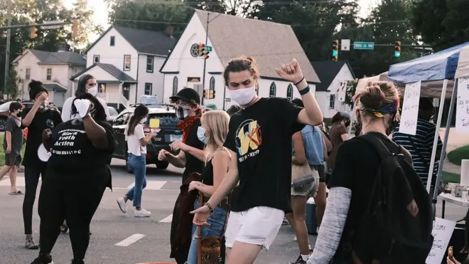 people waring mask and dancing