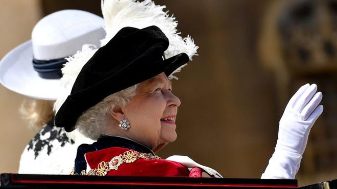 Queen Elizabeth waves to crowds