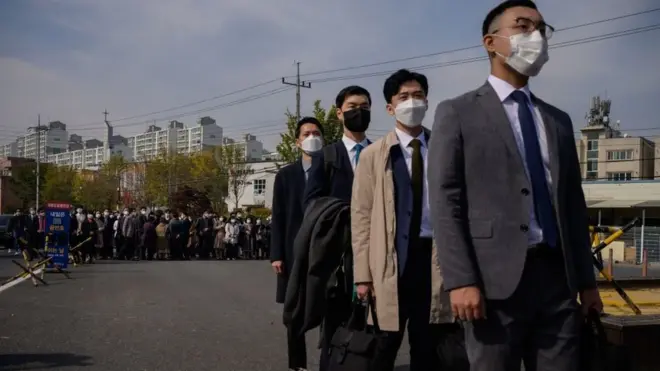South Korean Jehovah's Witnesses arrive for work as conscientious objectors