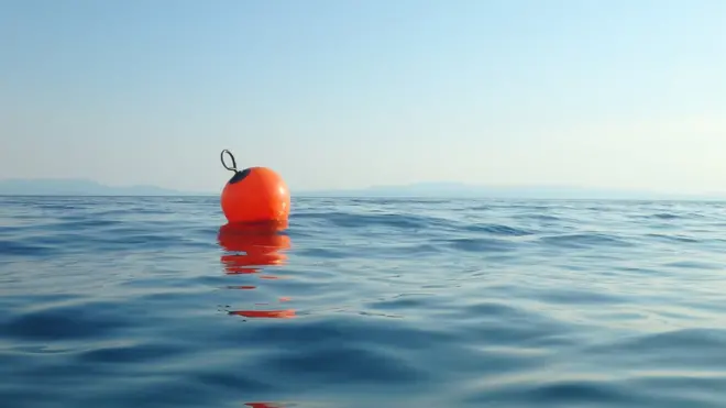 Vidam Perevertilov spent more than 14 hours clinging to an old fishing buoy before being rescued