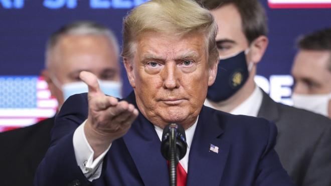 US President Donald J. Trump gestures during his speech during an Operation Warp Speed Vaccine Summit in the South Court Auditorium of the of the Eisenhower Executive Office Building at the White House in Washington, DC, USA, 08 December 2020.