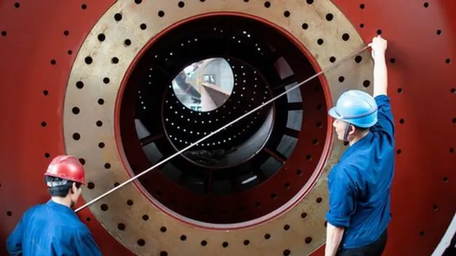 Workers in Jiangsu produce equipment for export to countries along China's Belt and Road