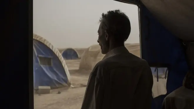 Omar saw IS fighters threaten to shoot people who tried to flee Mosul