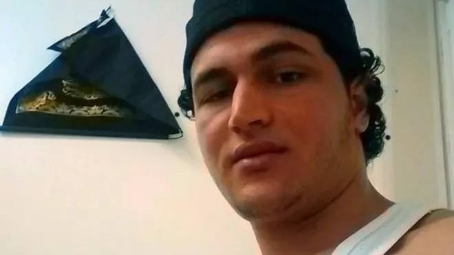 Archive images of the suspect have been released