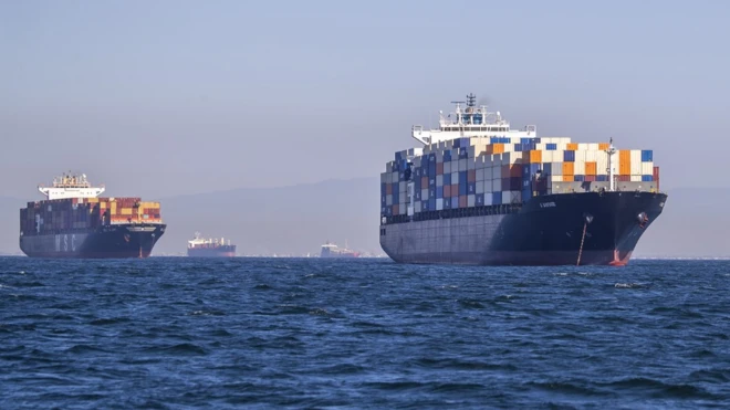 Dozens of container ships have been waiting off the California coastline