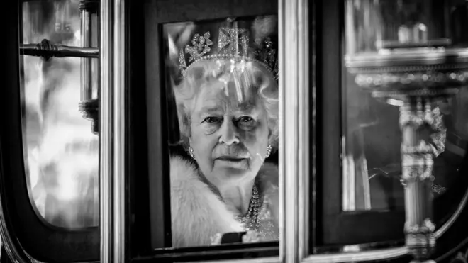The Queen travels in the horse drawn Australian State Coach to attend the State Opening of Parliament on 15 November 2006 in London, England.