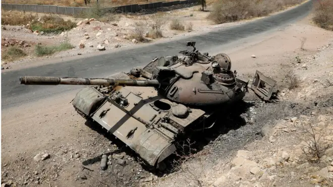 A tank damaged in fighting between Ethiopian government and Tigray forces pictured in March