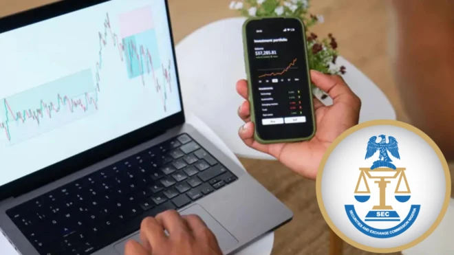 Trader dey analyse chart for im laptop and phone