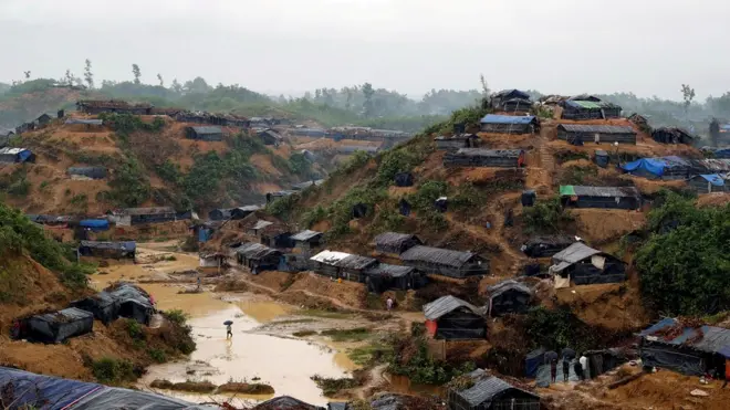 In neighbouring Bangladesh, sprawling camps house a city-sized population of refugees
