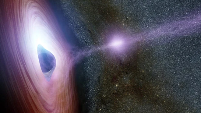 ภาพจำลองหลุมดำมวลยิ่งยวดที่ใจกลางดาราจักรกำลังปล่อยไอพ่นอนุภาคพลังงานสูง