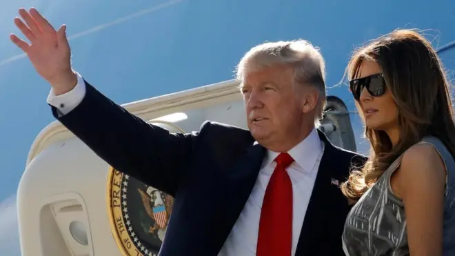 US President Donald Trump and first lady Melania Trump board Air Force One as they depart Hamburg, Germany, for Washington, 8 July 2017