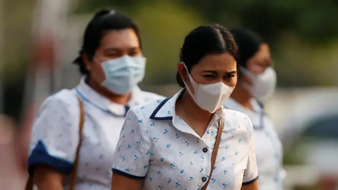 Students and school staff in Bangkok as Thailand announces a 14-day long closure of schools