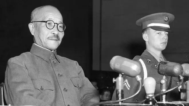 Hideki Tojo, left, on trial for war crimes, 1947