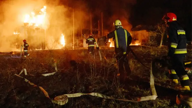 Firefighters work at a site of a power substation hit by a missile strike, as Russia's attack on Ukraine continues, in Lviv, Ukraine May 3, 2022