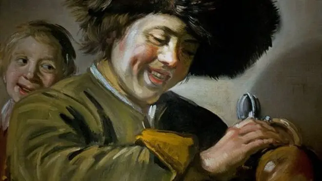 "Два юнаки, що сміються, із пивним глечиком"