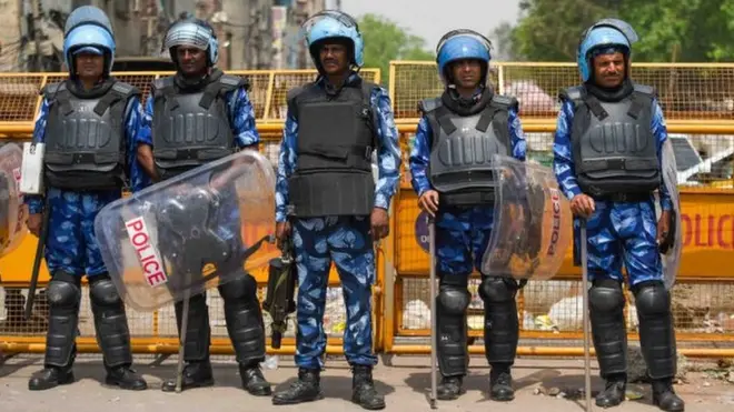 Rapid Action Force (RAF) personnel deployed after communal violence broke during a Shobha Yatra on Hanuman Jayanti, at Jahangirpuri, on April 17, 2022 in New Delhi, India.