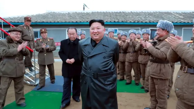 North Korea's leader Kim Jong-un (centre) has so far been tight-lipped about the latest test
