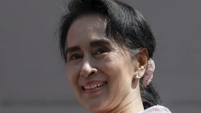 Myanmar's National League for Democracy party leader Aung San Suu Kyi talks to supporters after general elections in Yangon 9 November 2015.