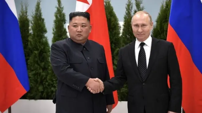 North Korea leader Kim Jong Un (L) attends a meeting with Russian President Vladimir Putin (R) in Vladivostok, Russia in 2019