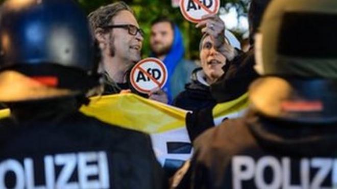 Opponents of the Alternative for Germany (AfD) protest against the result