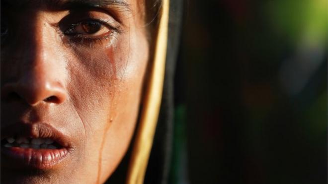 Close-up of a Rohingya woman crying in a refugee camp in Bangladesh (Oct 2017)