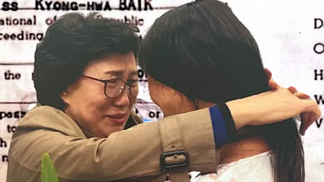 Han Tae-soon hugging her daughter when they were reunited after 44 years apart