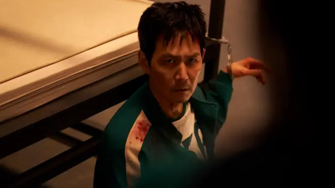 Південнокорейський актор Лі Чон Че, який зіграв головну роль у серіалі "Гра в Кальмара"