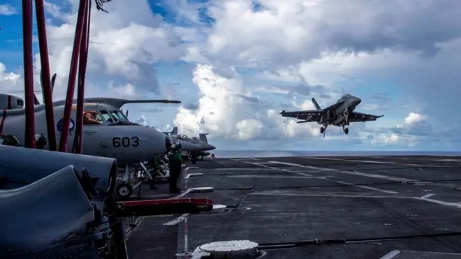 An F/A-18F Super Hornet, assigned to Strike Fighter Squadron (VFA) 41, prepares to make an arrested landing on the flight deck of the U.S. Navy Nimitz-class aircraft carrier USS Abraham Lincoln in the Pacific Ocean August 10, 2024. U.S.