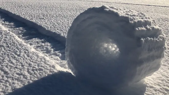 Brian Bayliss said he spotted the snow rollers as the sun rose on Saturday - but added by later that day they had collapsed