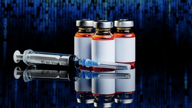 vaccine vials and syringes