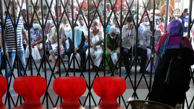OPD patients wait to consult doctors who have launched a trade union action at the National Hospital in Colombo, Sri Lanka on March 15, 2023.