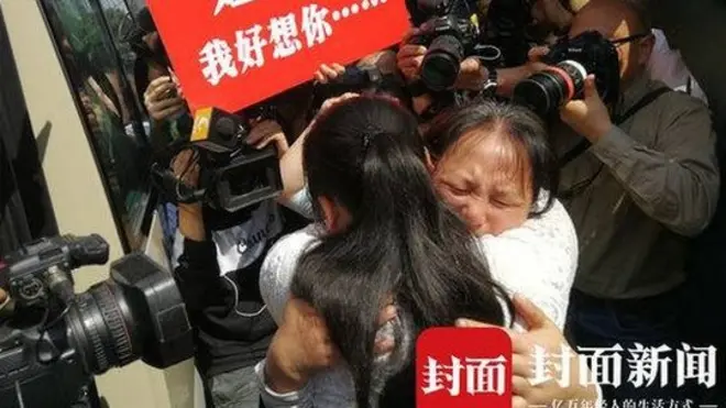 Kang Ying and her mother Liu Dengying hug after being reunited