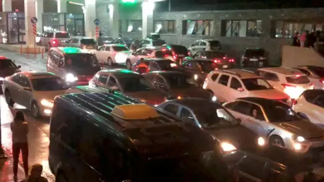 Queues of cars have sprung up at on Georgia's border - such as this at the Verkhny Lars checkpoint