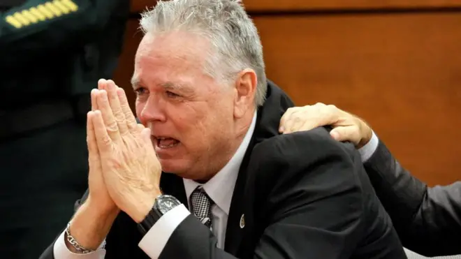Scot Peterson, a former sheriff's deputy accused of failing to protect students during the 2018 mass shooting at Parkland's Marjory Stoneman Douglas High School, reacts after he was found not guilty on all charges
