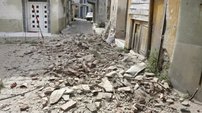 Debris in the streets after buildings were damaged in the Greek town of Plomari